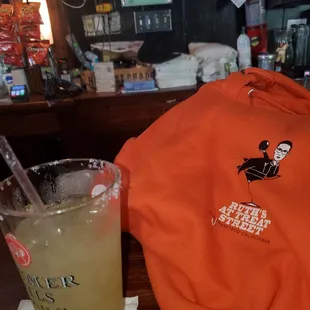 a t - shirt and a drink
