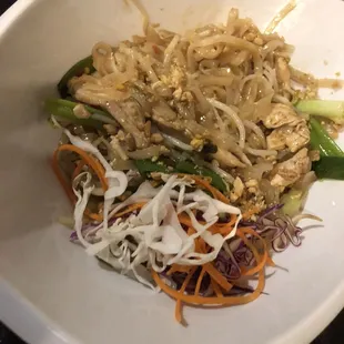 a bowl of noodles and vegetables