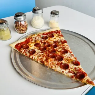 Pepperoni slice. $9. VERY big slice.