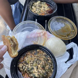 a person holding a piece of food