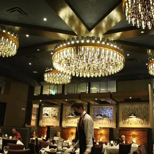 We arrived and we were seated in the main dining room. The ambience of Ruth Chris is upscale and moody with beautiful light fixtures.