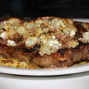 The Bone-In New York Strip was USDA Prime, full-bodied 19 oz bone-in cut, and is Ruth's Chris founder's favorite.