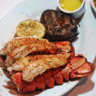 a plate of lobster and steak