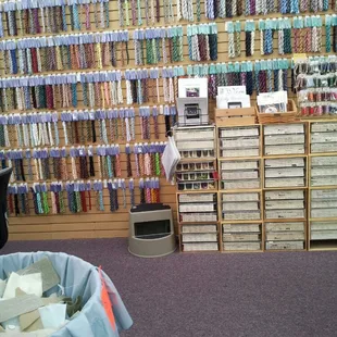 Embroidery floss and cross-stitch/needlepoint supplies.