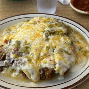 Dinner style green chile CFS. The fries are in the side