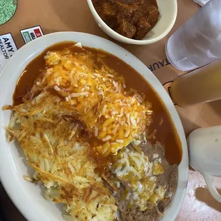 Huevos rancheros with legit NM red, and a side of top-notch carne adovada. If you know, you know!