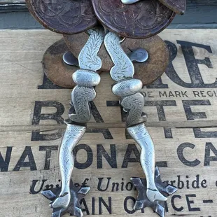 Hand made cowboy spurs and other artifacts.