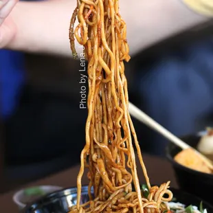 Spicy Shredded Chicken Cold Noodles ($11.99) - sesame sauce, carrots, cucumbers, bean sprout, peanut, cilantro, green onion