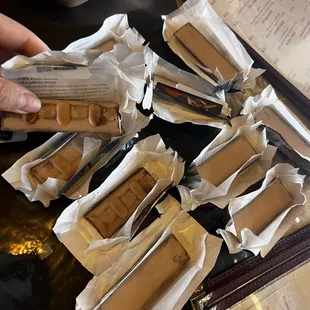 a person holding a package of food