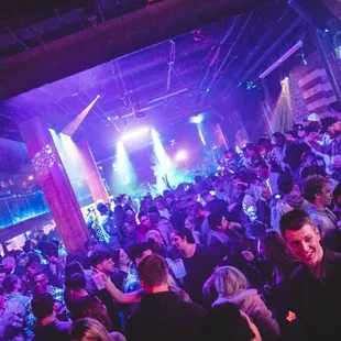 a crowd of people at a party