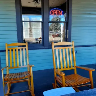 Front porch rockers, and electric outlet on the wall there.