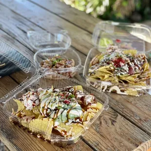 nachos and nachos on a picnic table