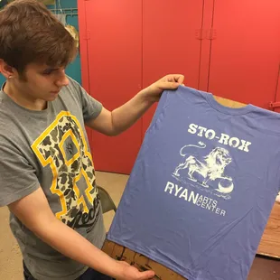 Teens printing T shirts as part of the afterschool program
