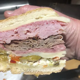 Personally my favorite Muffalata. It's not traditional but kicks ass! Just look at it...