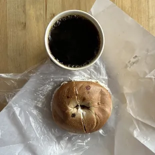 a cup of coffee and a bagel