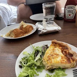 Meat quiche (bacon, carmalized onion, cheese) and their mandarin orange cupcake