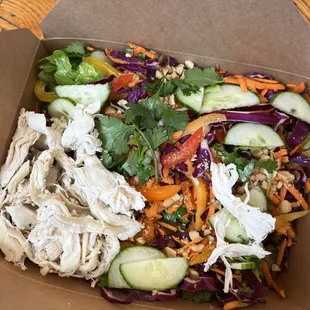 a salad in a box on a table