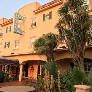 Hotel and peacocks