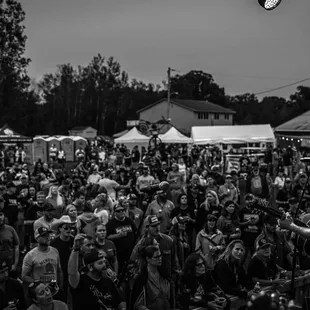 a crowd of people at a music festival