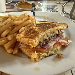 Patty Melt with grilled and raw onions, add lettuce and tomatoes with regular fries