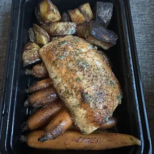 Salmon with potatoes and carrots