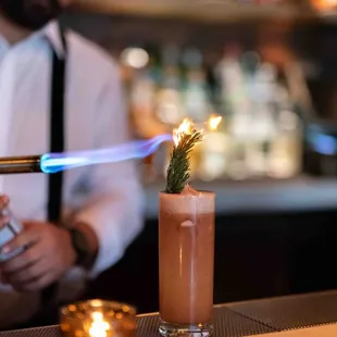 Enjoy handcrafted cocktails in a warm setting.