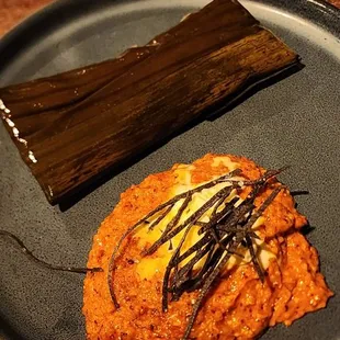 Tamale with locally sourced corn grits. Corn ice cream on top of the grits was delish. Tasty overall, but small.