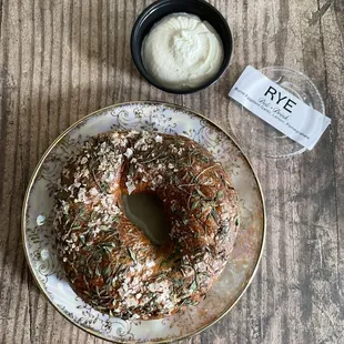 Thyme + sea salt bagel w/burnt eggplant, garlic, lemon and pomegranate labneh