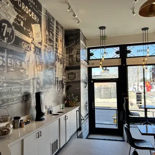 a coffee shop with a chalkboard wall