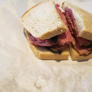 My friend and I each ate one half while it was warm and then ordered another sandwich to split.