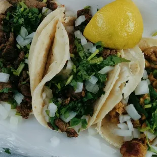 2 asada and 1 pastor  They saran wrap your order when you ask for it to go