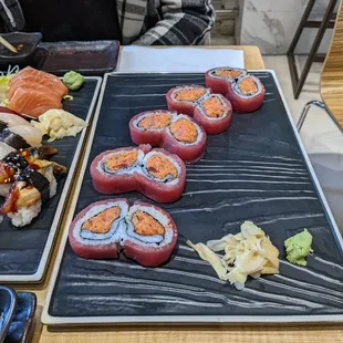 a variety of sushi on plates