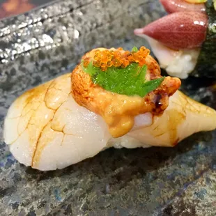 Uni Hotate (Hokkaido Scallop topped with Hokkaido Sea Urchin) what make it special is the combination of both ingredient's sweetnesses!