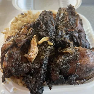 Small jerk chicken with peas and rice $9