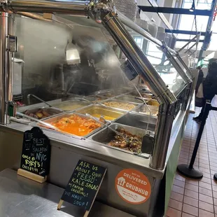 a buffet with a variety of food items