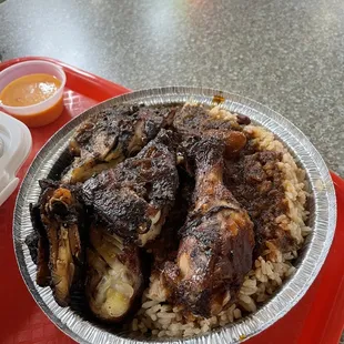 Jerk Chicken with Rice and Peas, so damn flavorful!!!