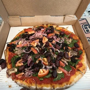 Medium veggie no cheese add Kalamata olives
