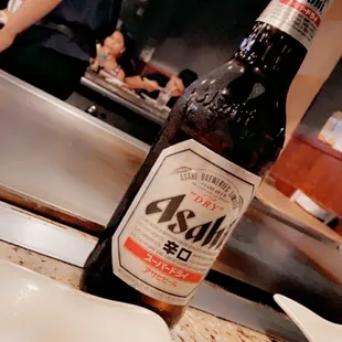 a bottle of beer on a counter