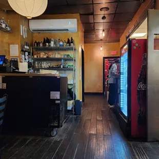 a man standing in a restaurant