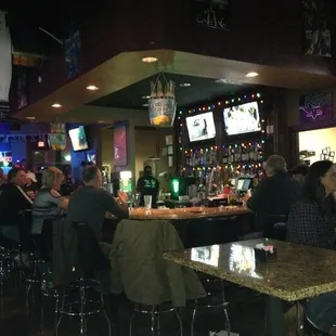 people sitting at the bar