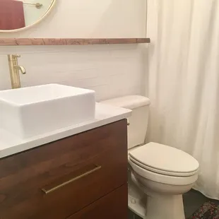a bathroom with a sink and toilet