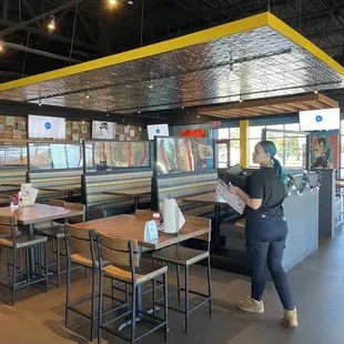 a woman reading a menu