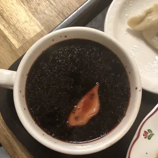 Red Borsch Soup with Mushroom Dumplings