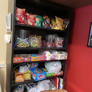 a shelf full of snacks