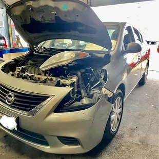 This is before and after pictures, of a 2014 Nissan Versa with a accident in the front bumper driver side!