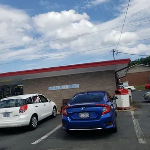 two cars in a parking lot
