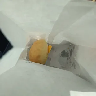 a sandwich in a paper bag