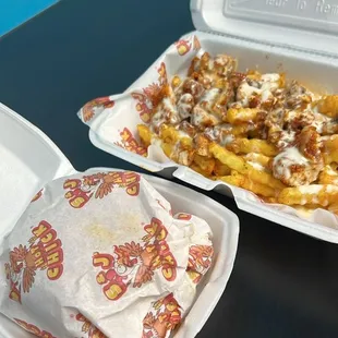 a box of fries and a container of fries