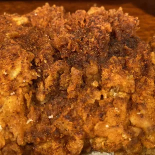 They have chili in the flour mix as well as on top of the sandwiches. Bring the heat!