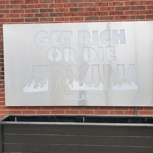 a sign on the side of a building
